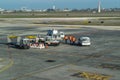 BOLOGNA, ITALY Ã¢â¬â FEB 18: Airport workers waiting for a plane t